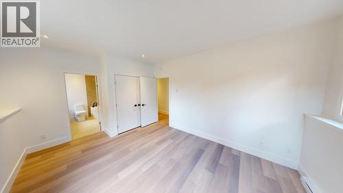 Primary Bedroom - 7291 Prospector Avenue Unit# 401, Radium Hot Springs, BC - Indoor Photo Showing Other Room