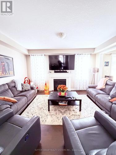 693 Doon South Drive, Kitchener, ON - Indoor Photo Showing Living Room With Fireplace