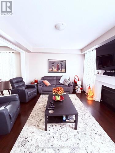 693 Doon South Drive, Kitchener, ON - Indoor Photo Showing Living Room With Fireplace