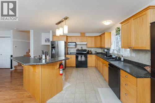 8311 Flamingo Road, Prince George, BC - Indoor Photo Showing Kitchen With Double Sink