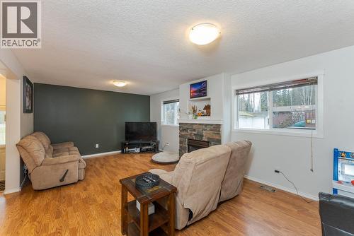 8311 Flamingo Road, Prince George, BC - Indoor Photo Showing Living Room With Fireplace