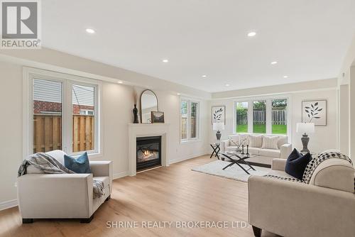 899 Bradshaw Crescent, London North (North C), ON - Indoor Photo Showing Living Room With Fireplace