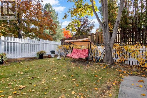 Yard space between the home & garage - 393 Mccarren Avenue, Kelowna, BC - Outdoor