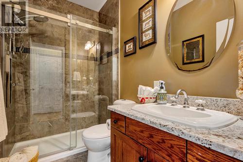 Full bathroom on main level with walk in shower - 393 Mccarren Avenue, Kelowna, BC - Indoor Photo Showing Bathroom