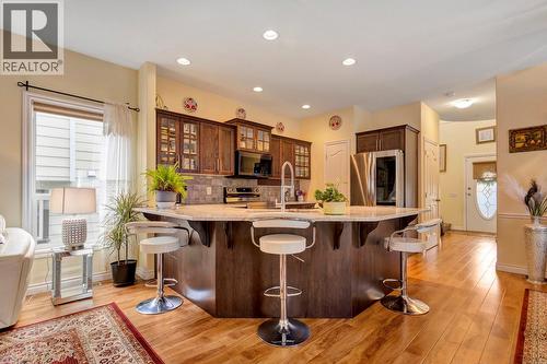 Well kept home with traditional flare - 393 Mccarren Avenue, Kelowna, BC - Indoor Photo Showing Kitchen With Upgraded Kitchen