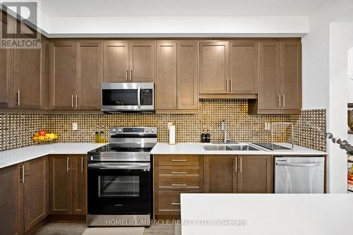 58 June Callwood Way, Brant, ON - Indoor Photo Showing Kitchen With Double Sink With Upgraded Kitchen