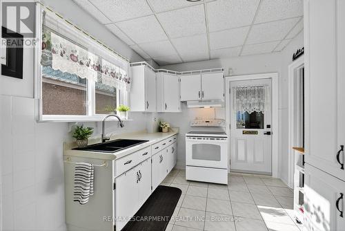 46 Weir Street S, Hamilton, ON - Indoor Photo Showing Kitchen With Double Sink