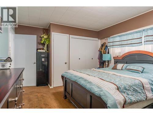 8329 Highway 3B, Trail, BC - Indoor Photo Showing Bedroom