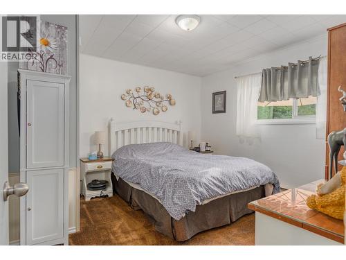8329 Highway 3B, Trail, BC - Indoor Photo Showing Bedroom