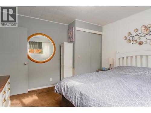 8329 Highway 3B, Trail, BC - Indoor Photo Showing Bedroom