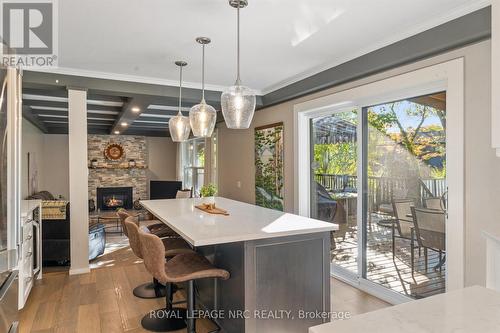 16 Briarfield Crescent, St. Catharines (Glendale/Glenridge), ON - Indoor Photo Showing Dining Room With Fireplace