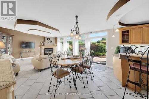 8065 Kipling Avenue, Vaughan, ON - Indoor Photo Showing Dining Room With Fireplace