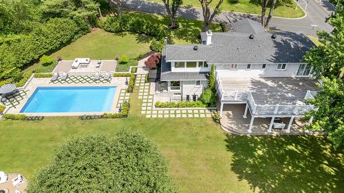 Aerial photo - 1975 Place Nightingale, Saint-Bruno-De-Montarville, QC - Outdoor With In Ground Pool With Deck Patio Veranda