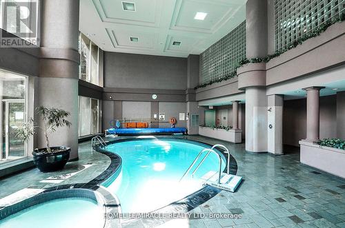 #1701 - 50 Eglinton Ave W, Mississauga, ON - Indoor Photo Showing Other Room With In Ground Pool