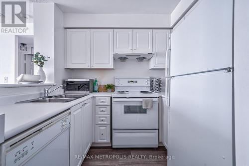 Ph109 - 11 Lee Centre Drive, Toronto, ON - Indoor Photo Showing Kitchen With Double Sink