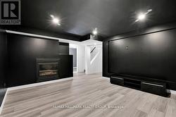 Media room with fireplace. - 