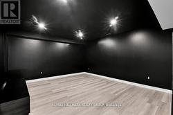 Pot-lighting and laminate floor. - 