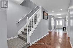 Gorgeous hardwood floors and pot-lighting - 