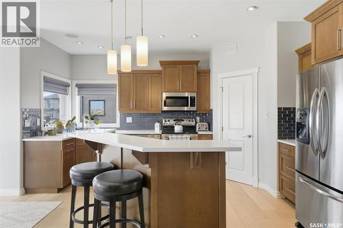 106 Thode Avenue, Saskatoon, SK - Indoor Photo Showing Kitchen With Stainless Steel Kitchen With Upgraded Kitchen