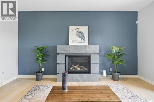 106 Thode Avenue, Saskatoon, SK - Indoor Photo Showing Living Room With Fireplace
