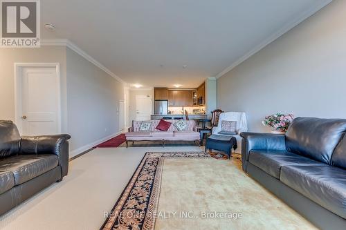 101 - 830 Megson Terrace, Milton, ON - Indoor Photo Showing Living Room