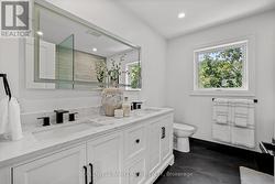 Double Sinks in the Primary Bathroom. - 