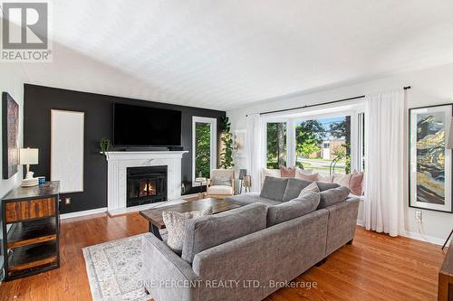 1042 Harkness Avenue, Ottawa, ON - Indoor Photo Showing Living Room With Fireplace