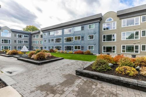 112-1045 Sutherland Avenue, Kelowna, BC - Outdoor With Facade