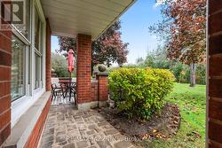 Covered patio area offering private spot to relax - 