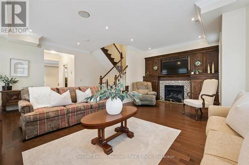 10 - 2061 Maria Street, Burlington (Brant), ON - Indoor Photo Showing Living Room With Fireplace