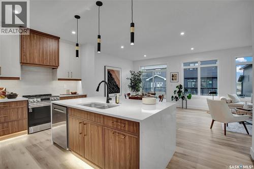 911 Traeger Manor, Saskatoon, SK - Indoor Photo Showing Kitchen With Double Sink With Upgraded Kitchen