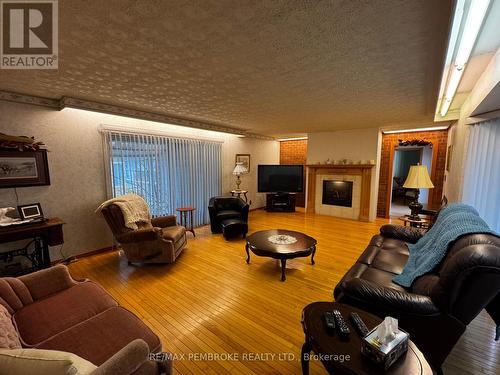 Main floor living room. - 580 Miller Street, Pembroke, ON - Indoor Photo Showing Living Room With Fireplace