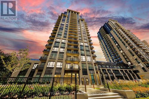1610 - 202 Burnhamthorpe Road E, Mississauga, ON - Outdoor With Balcony With Facade