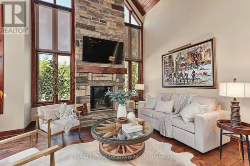 115 Venture Boulevard, Blue Mountains, ON - Indoor Photo Showing Living Room With Fireplace