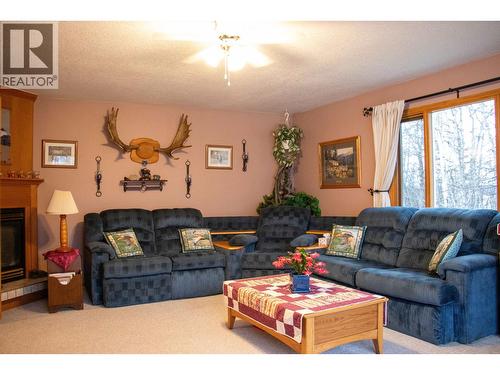 14398 Siphon Creek Road, Fort St. John, BC - Indoor Photo Showing Living Room With Fireplace
