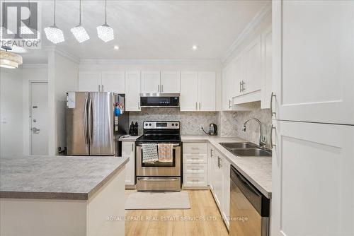 212 - 1275 Cornerbrook Place, Mississauga, ON - Indoor Photo Showing Kitchen With Stainless Steel Kitchen With Double Sink With Upgraded Kitchen