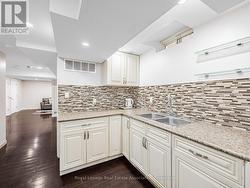 LOWER LEVEL KITCHEN - 