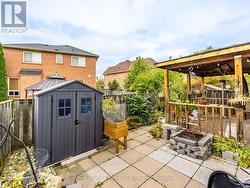 BACKYARD WITH GAZEBO AND SHED - 