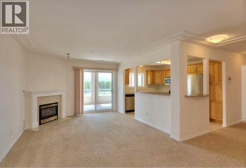 1967 Underhill Street Unit# 604, Kelowna, BC - Indoor With Fireplace