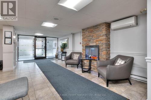 301 - 64 Benton Street, Kitchener, ON - Indoor With Fireplace