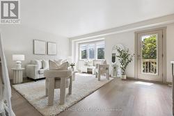 Living Room with View of Door to Balcony - 