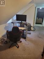 Upper level landing is a spacious games room - 