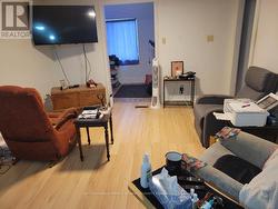 Large living room and adjoining sunroom - 