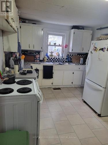 Practical country style kitchen - 11 Low Street, Prince Edward County (Picton Ward), ON - Indoor Photo Showing Kitchen
