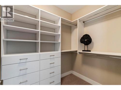 Primary Walk-in Closet - 1673 Travertine Drive, Lake Country, BC - Indoor With Storage