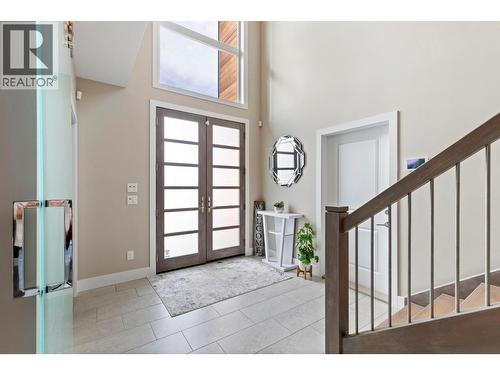 Grade Level entrance - 1673 Travertine Drive, Lake Country, BC - Indoor Photo Showing Other Room