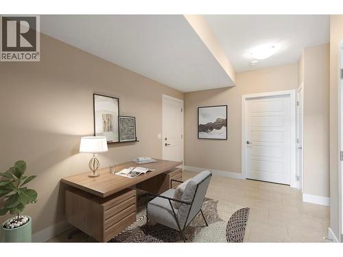 Entrance off garage - photo is stage.  Built-ins in this area would make a perfect mud room. - 1673 Travertine Drive, Lake Country, BC - Indoor Photo Showing Other Room