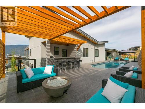 Photo from previous sale - 1673 Travertine Drive, Lake Country, BC - Outdoor With In Ground Pool With Deck Patio Veranda With Exterior