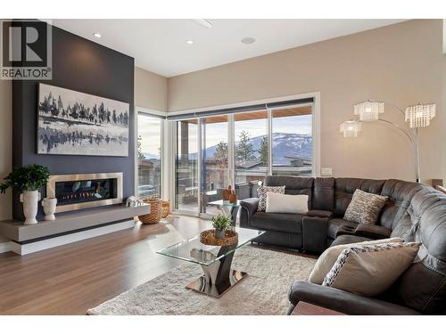 1673 Travertine Drive, Lake Country, BC - Indoor Photo Showing Living Room With Fireplace