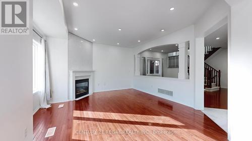 4274 Vivaldi Road, Burlington, ON - Indoor Photo Showing Other Room With Fireplace